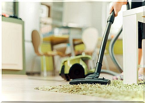 Vacuuming the floor