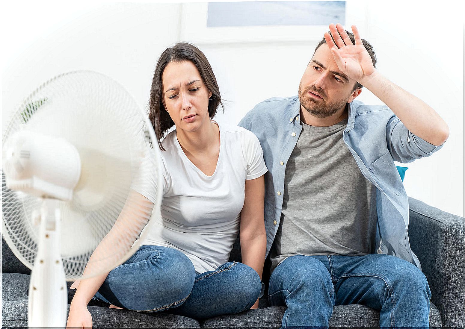 Couple suffering from wet heat wave.