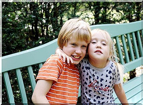 Autistic boy with his sister.