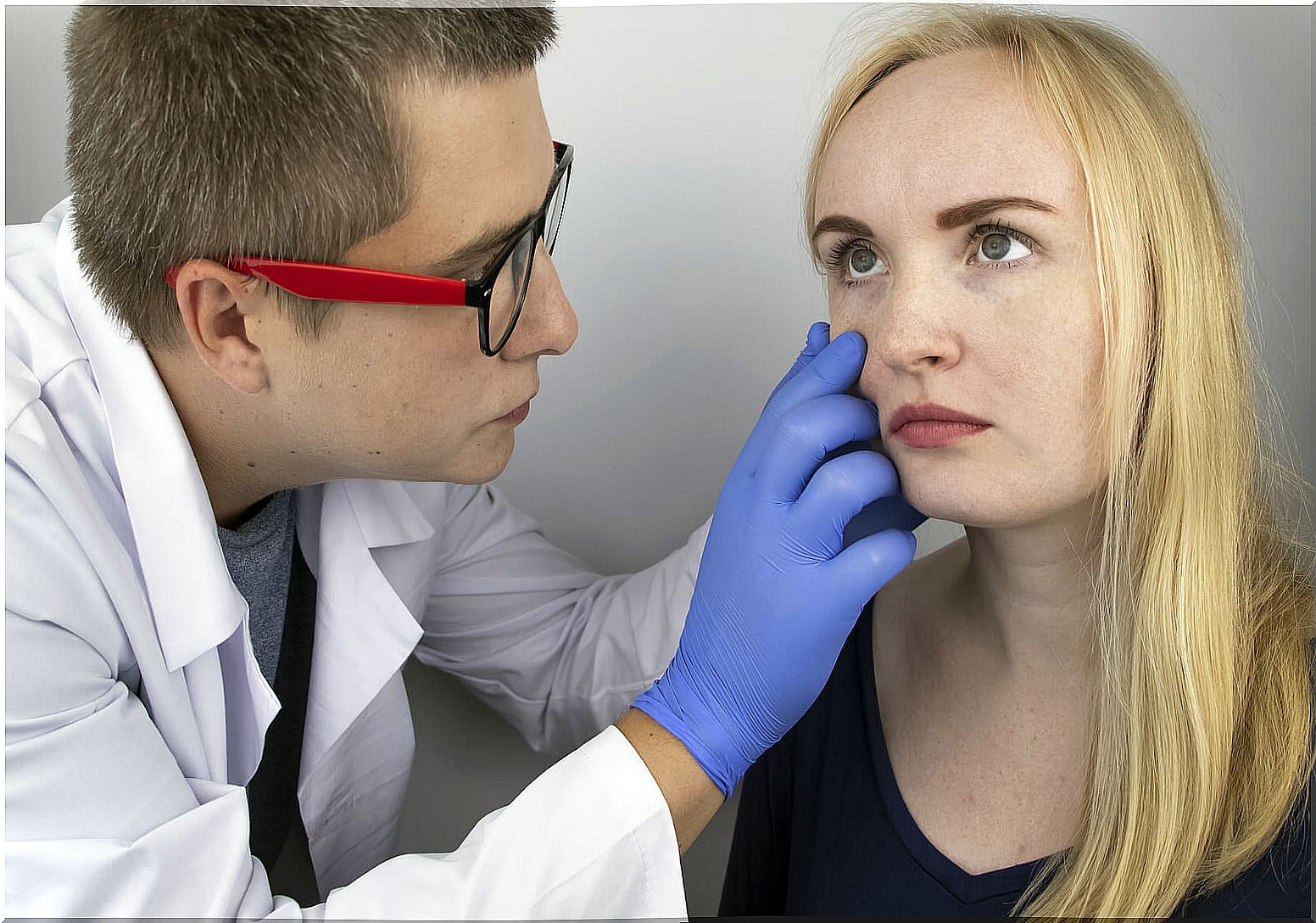 Doctor checks vision of a patient with optic neuromyelitis.