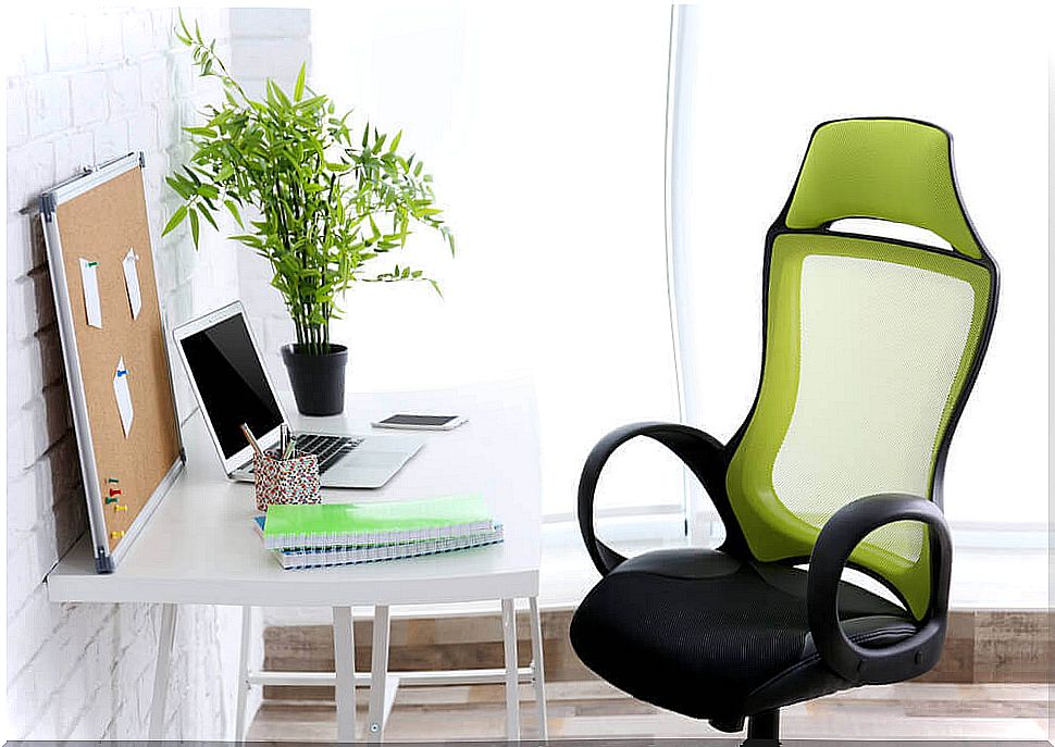 Computer chair with armrests.